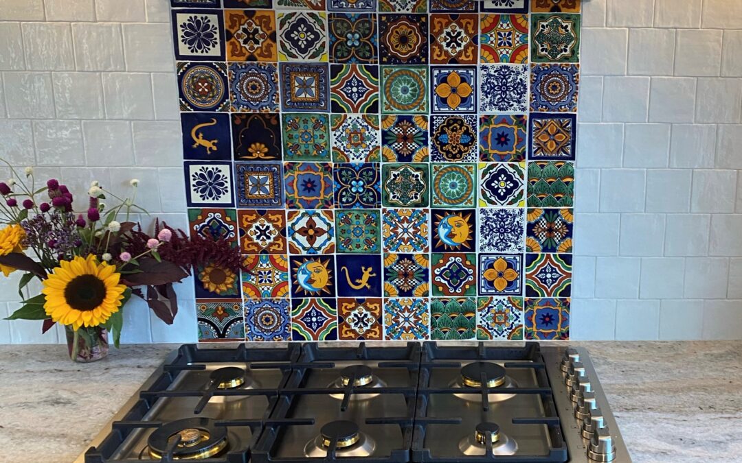 Backsplashes in Kitchen Design, showing a mosaic quilt tile pattern over the range.